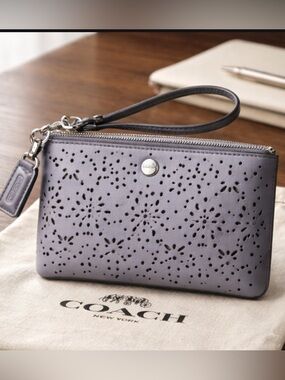 COACH Corner Zip Leather Wristlet Perforated Flower In Metallic purple